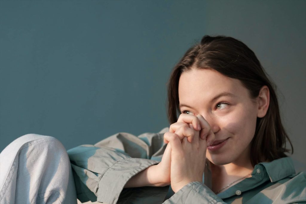 Smiling woman in distance