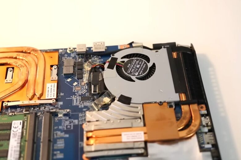opened laptop - repairs howing internal components with cpu, heatsink, ram modules